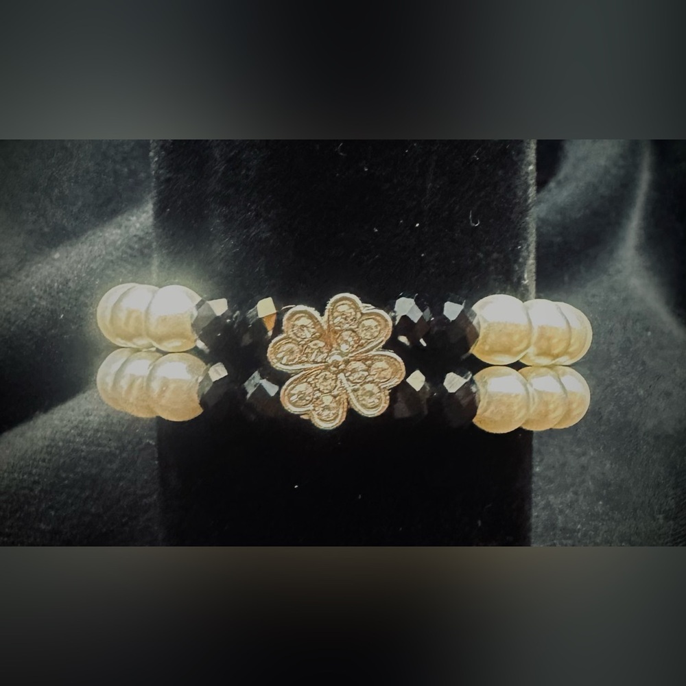Elegant Black and Gold Floral Bracelet